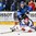 GRAND FORKS, NORTH DAKOTA - APRIL 21: Russia's Alexei Lipanov #10 reaches for the puck while falling while Finland's Markus Nurmi #27 looks on during quarterfinal round action at the 2016 IIHF Ice Hockey U18 World Championship. (Photo by Minas Panagiotakis/HHOF-IIHF Images)

